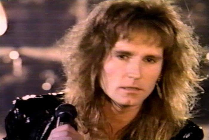 Screenshot from the music video for 'When I See You Smile'