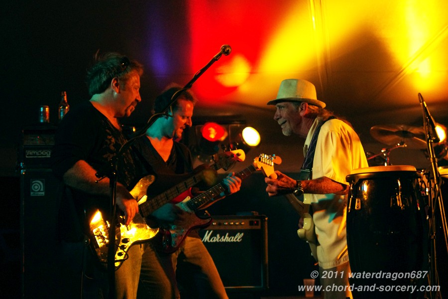 Ken Halland, Jim Coughlin, and Alex Ligertwood live in Red Wing, Minnesota, 6 August, 2011. Photo copyright waterdragon687; not to be reproduced without permission.