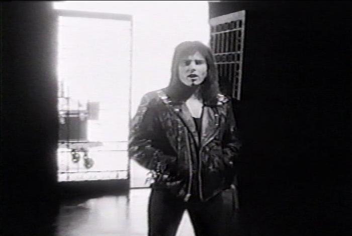Screenshot from the music video for Survivor's song 'Across The Miles'