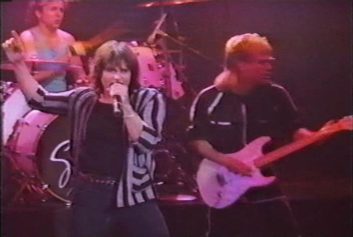 Screenshot from the music video for Survivor's song 'Burning Heart'