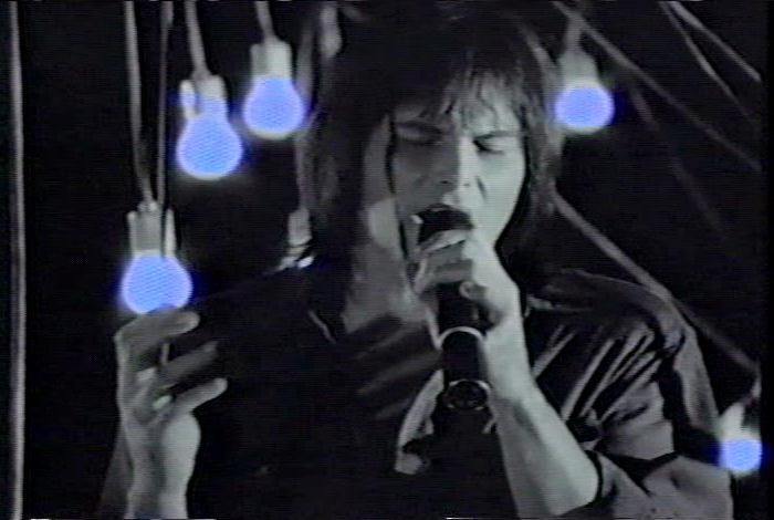 Screenshot from the music video for Survivor's song 'High On You'