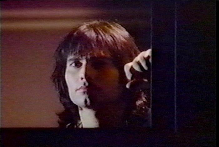 Screenshot from the music video for Survivor's song 'High On You'