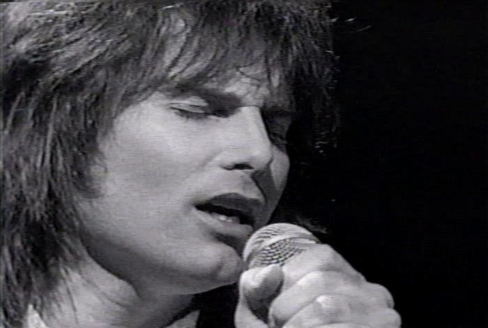 Screenshot from the music video for Survivor's song 'Man Against The World'