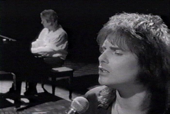 Screenshot from the music video for Survivor's song 'Man Against The World'
