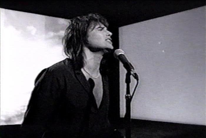 Screenshot from the music video for Survivor's song 'Man Against The World'