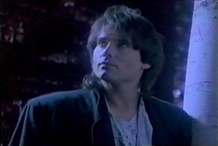 Screenshot from the music video for Survivor's song 'The Search Is Over'