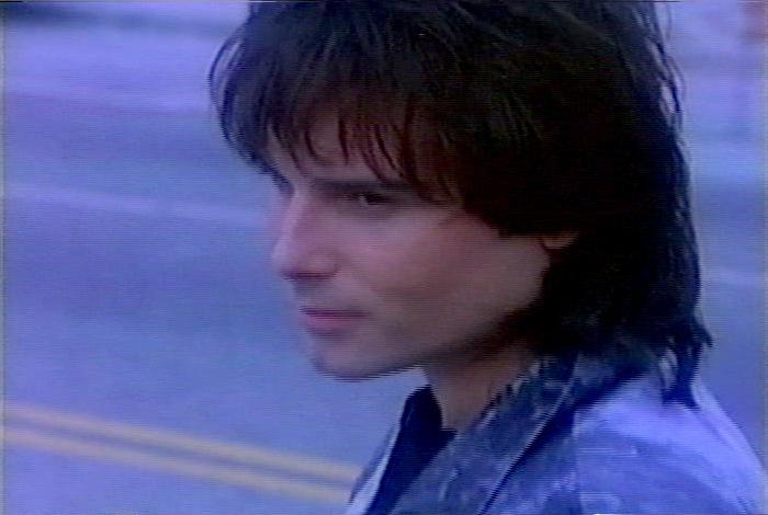 Screenshot from the music video for Survivor's song 'The Search Is Over'